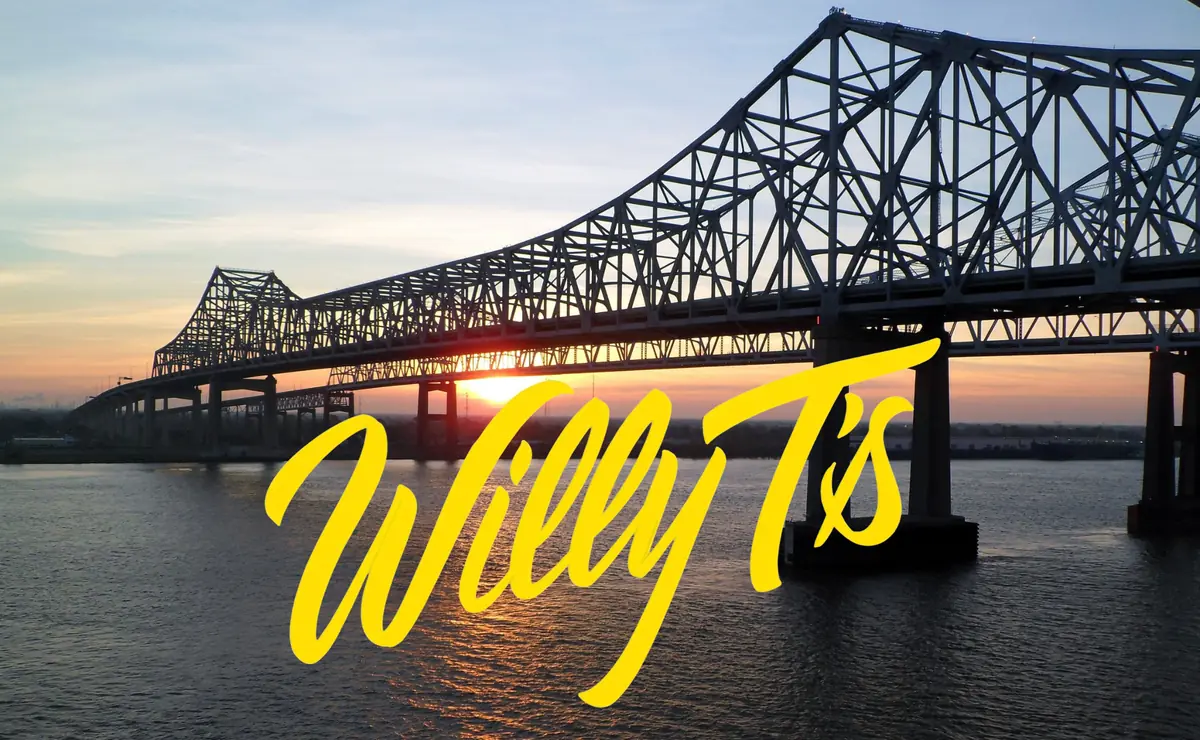 The Crescent City Connection over the Mississippi at sunset