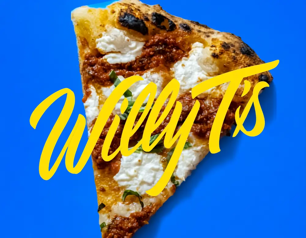 A slice of Willy T's pizza